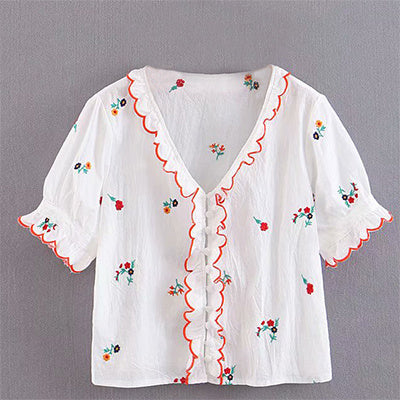 Embroidered ruffled shirt top